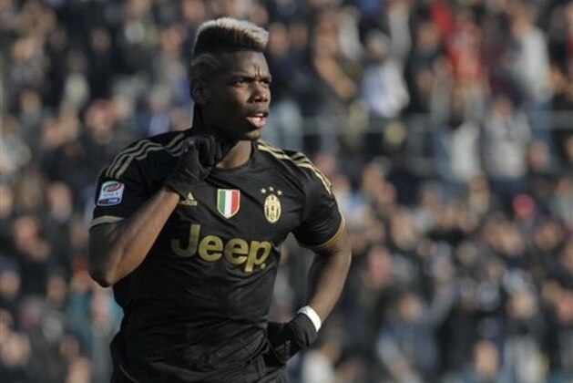 Juventus’ Paul Pogba celebrates after scoring a goal during a Serie A soccer match against Carpi, at Modena's Braglia stadium, Italy, Sunday, Dec. 20, 2015. (AP Photo/Marco Vasini)