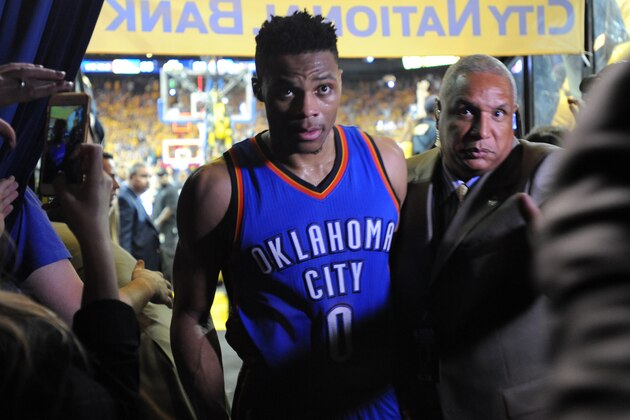 OAKLAND, CA - MAY 30:  Russell Westbrook #0 of the Oklahoma City Thunder walks off the court after being defeated 96-88 by the Golden State Warriors in Game Seven of the Western Conference Finals during the 2016 NBA Playoffs at ORACLE Arena on May 30, 2016 in Oakland, California. NOTE TO USER: User expressly acknowledges and agrees that, by downloading and or using this photograph, User is consenting to the terms and conditions of the Getty Images License Agreement.  (Photo by Robert Reiners/Getty Images)