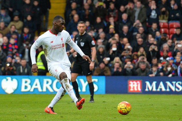 Liverpool's Zaire-born Belgian striker Christian Benteke scores their late winnning goal from the penalty spot during the English Premier League football match between Crystal Palace and Liverpool at Selhurst Park in south London on March 6, 2016.
Liverpool won the game 2-1. / AFP / GLYN KIRK / RESTRICTED TO EDITORIAL USE. No use with unauthorized audio, video, data, fixture lists, club/league logos or 'live' services. Online in-match use limited to 75 images, no video emulation. No use in betting, games or single club/league/player publications.  /         (Photo credit should read GLYN KIRK/AFP/Getty Images)