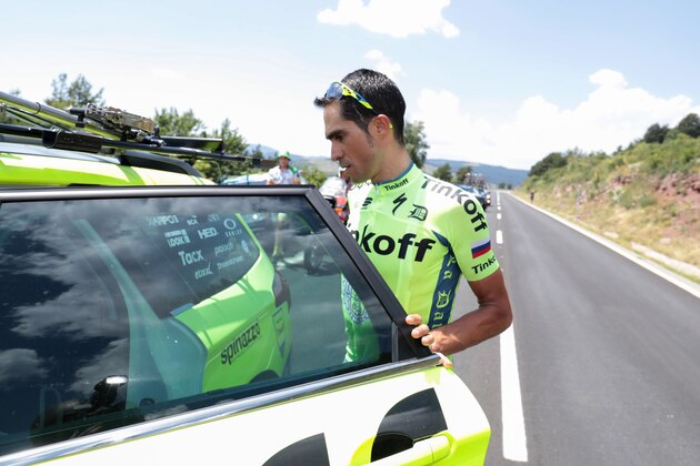 Spain's Alberto Contador gets in his team car after dropping out of the 184,5 km ninth stage of the 103rd edition of the Tour de France cycling race on July 10, 2016 between Vielha Val d'Aran and Andorre Arcalis.

 / AFP / KENZO TRIBOUILLARD        (Photo credit should read KENZO TRIBOUILLARD/AFP/Getty Images)