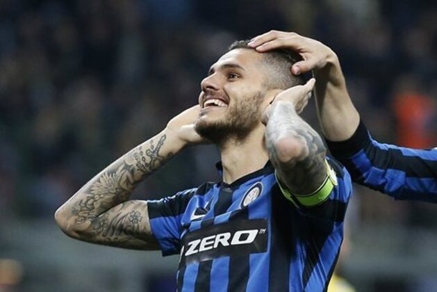 Inter Milan's Mauro Icardi celebrates after scoring during the Serie A soccer match between Inter Milan and Napoli at the San Siro stadium in Milan, Italy, Saturday, April 16, 2016. (AP Photo/Antonio Calanni)
