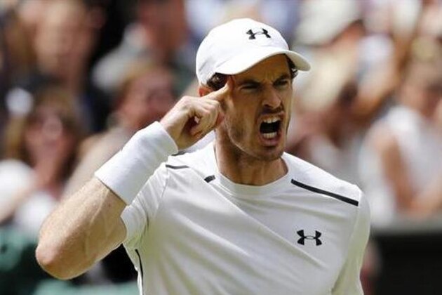 Andy Murray of Britain celebrates winning a point against Milos Raonic of Canada during the men's singles final on the fourteenth day of the Wimbledon Tennis Championships in London, Sunday, July 10, 2016. (AP Photo/Ben Curtis)