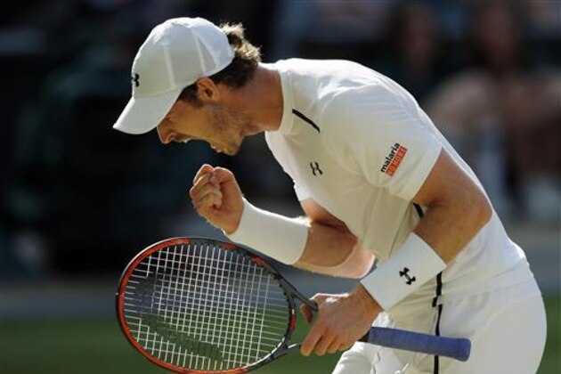 Andy Murray of Britain celebrates after winning a point against Tomas Berdych of the Czech Republic during their men's semifinal singles match on day twelve of the Wimbledon Tennis Championships in London, Friday, July 8, 2016. (AP Photo/Alastair Grant)