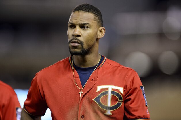 MINNEAPOLIS, MN - JULY 01: Byron Buxton #25 of the Minnesota Twins looks on during the game against the Texas Rangers on July 1, 2016 at Target Field in Minneapolis, Minnesota. The Rangers defeated the Twins 3-2 in ten innings. (Photo by Hannah Foslien/Getty Images) MINNEAPOLIS, MN - JULY 01: Byron Buxton #25 of the Minnesota Twins looks on during the game against the Texas Rangers on July 1, 2016 at Target Field in Minneapolis, Minnesota. The Rangers defeated the Twins 3-2 in ten innings. (Photo by Hannah Foslien/Getty Images)