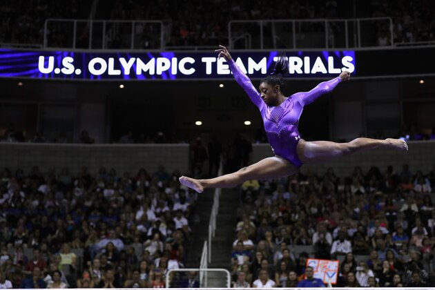 SAN JOSE, CA - JULY 08:  Simone Biles competes on the balance beam during day 1 of the 2016 U.S. Olympic Women's Gymnastics Team Trials at SAP Center on July 8, 2016 in San Jose, California.  (Photo by Ronald Martinez/Getty Images)