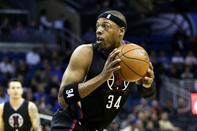 Los Angeles Clippers forward Paul Pierce looks for an open shot against the Orlando Magic during the first half of an NBA basketball game, Friday, Feb. 5, 2016, in Orlando, Fla. (AP Photo/John Raoux)