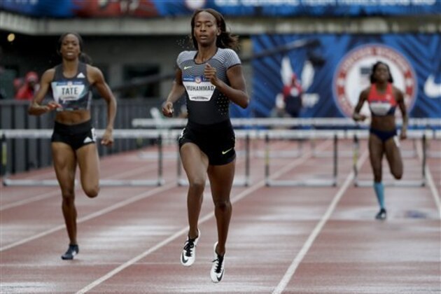 Dalilah Muhammad wins her heat during the semifinals for women’s 400-meter hurdles at the U.S. Olympic Track and Field Trials, Friday, July 8, 2016, in Eugene Ore. (AP Photo/Marcio Jose Sanchez)