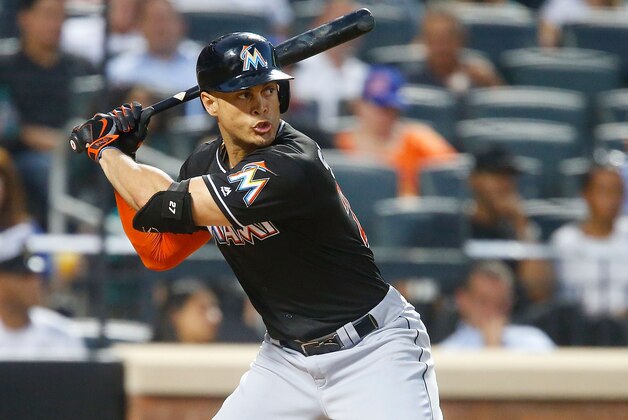 NEW YORK, NY - JULY 05:  Giancarlo Stanton #27 of the Miami Marlins in action against the New York Mets at Citi Field on July 5, 2016 in the Flushing neighborhood of the Queens borough of New York City. The Marlins defeated the Mets 5-2.  (Photo by Jim McIsaac/Getty Images)