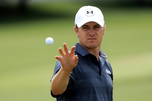 AKRON, OH - JULY 02: Jordan Spieth catches a ball on the practice range during the third round of the World Golf Championships - Bridgestone Invitational at Firestone Country Club South Course on July 2, 2016 in Akron, Ohio.  (Photo by Sam Greenwood/Getty Images)