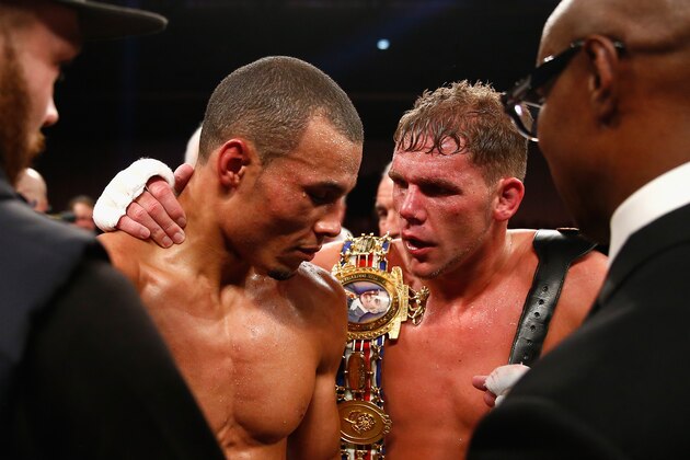 LONDON, ENGLAND - NOVEMBER 29:  Billy Joe Saunders consoles Chris Eubank Junior after defeating him on points in the british european and commonwealth middleweight championships during Boxing at ExCel on November 29, 2014 in London, England.  (Photo by Julian Finney/Getty Images)