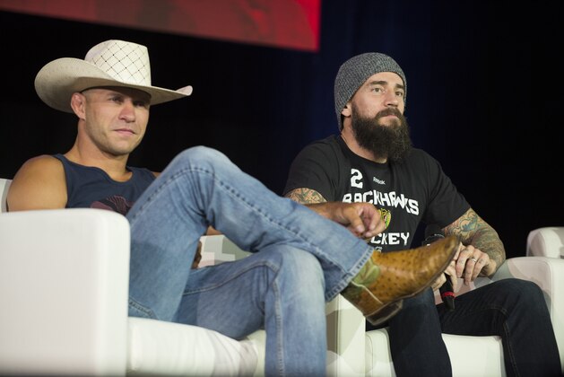 LAS VEGAS, NV - JULY 10: Donald 'Cowboy' Cerrone and CM Punk look on during UFC Fan Expo Day 3 at the Las Vegas Convention Center on July 10, 2016 in Las Vegas, Nevada. (Photo by Cooper Neill/Zuffa LLC/Zuffa LLC via Getty Images)