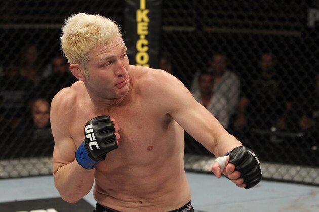 LAS VEGAS, NV - DECEMBER 03:  Jason 'Mayhem' Miller stands in the Octagon during his bout against Michael Bisping during The Ultimate Fighter 14 Finale at the Pearl Theatre at the Palms Hotel and Casino on December 3, 2011 in Las Vegas, Nevada.  (Photo by Josh Hedges/Zuffa LLC/Zuffa LLC via Getty Images)
