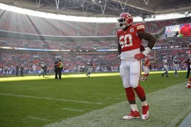 Kansas City Chiefs outside linebacker Justin Houston (50), left, stands on the field during the warm-up during the NFL football game between Detroit Lions and Kansas City Chiefs Wembley Stadium in London,  Sunday, Nov. 1, 2015. (AP Photo/Matt Dunham)