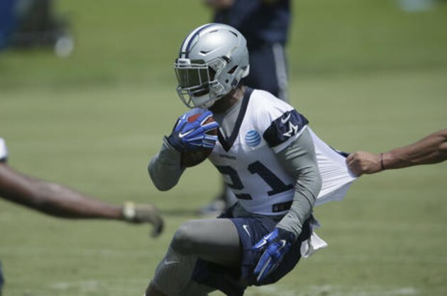 Dallas Cowboys running back Ezekiel Elliott (21) takes part in drills during the NFL football team's minicamp at Valley Ranch in Irving, Texas, Wednesday, June 15, 2016. (AP Photo/LM Otero)
