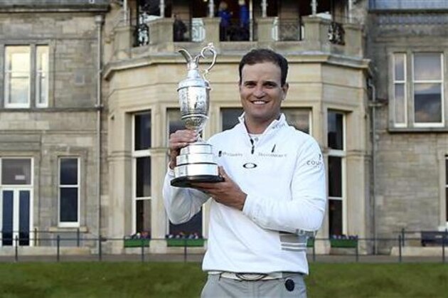 FILE - In this July 20, 2015, file photo, United States' Zach Johnson poses with the Claret Jug after winning a playoff after the final round at the British Open Golf Championship at the Old Course, St. Andrews, Scotland. Johnson will get the chance to defend his Open title scheduled when the championship is  held from July 14–17, 2016 at Royal Troon Golf Club in Ayrshire, Scotland. (AP Photo/Peter Morrison, File)