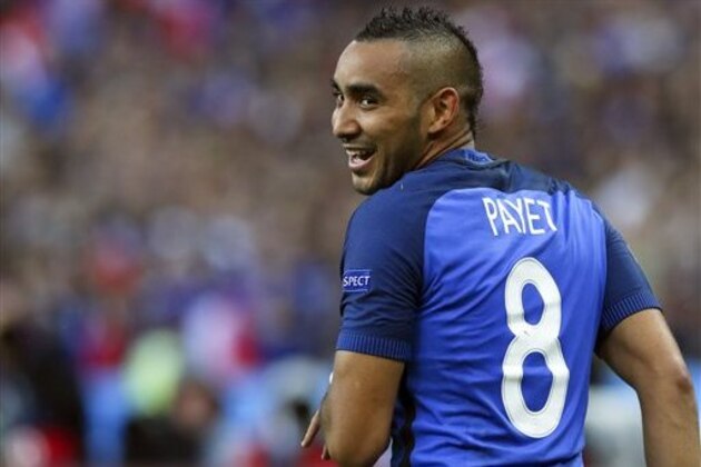 France's Dimitri Payet smiles during the Euro 2016 quarterfinal soccer match between France and Iceland, at the Stade de France in Saint-Denis, north of Paris, France, Sunday, July 3, 2016. (AP Photo/Thibault Camus)