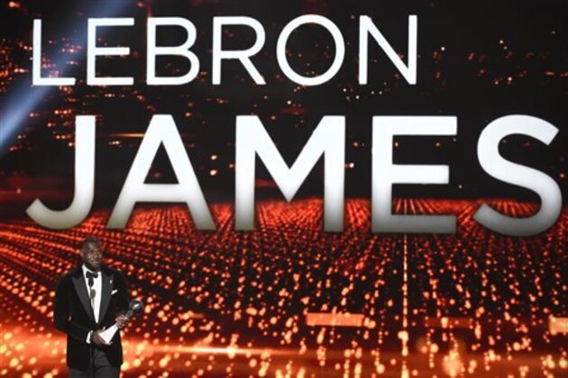 NBA player LeBron James, of the Cleveland Cavaliers, accepts the award for best championship performance at the ESPY Awards at the Microsoft Theater on Wednesday, July 15, 2015, in Los Angeles. (Photo by Chris Pizzello/Invision/AP)