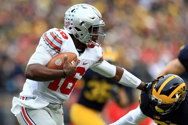 ANN ARBOR, MI - NOVEMBER 28: Quarterback J.T. Barrett #16 of the Ohio State Buckeyes runs the ball during the game against the Michigan Wolverines at Michigan Stadium on November 28, 2015 in Ann Arbor, Michigan. Ohio State defeated Michigan 42-13. (Photo by Andrew Weber/Getty Images)