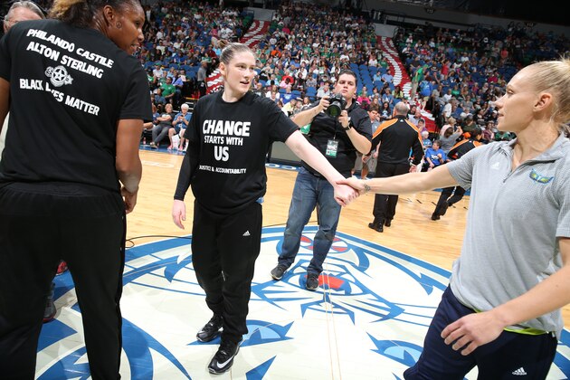 MINNEAPOLIS, MN - JULY 9:  Lindsay Whalen #13 of the Minnesota Lynx greets Erin Phillips #31 of the Dallas Wings before the game during a WNBA game on July 9, 2016 at Target Center in Minneapolis, Minnesota. NOTE TO USER: User expressly acknowledges and agrees that, by downloading and or using this Photograph, user is consenting to the terms and conditions of the Getty Images License Agreement. Mandatory Copyright Notice: Copyright 2016 NBAE (Photo by David Sherman/NBAE via Getty Images)