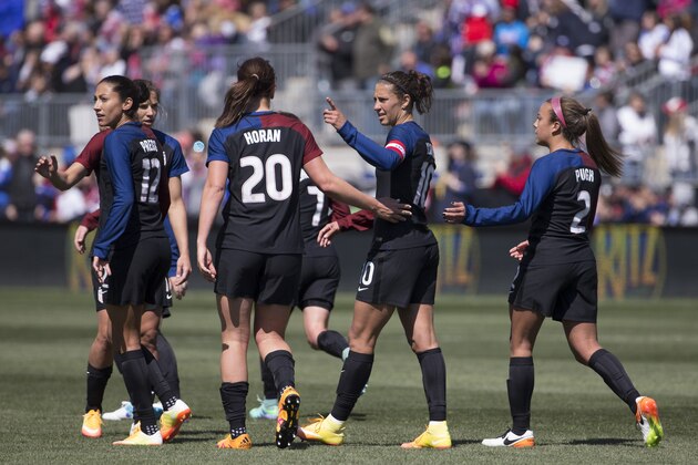CHESTER, PENNSYLVANIA - APRIL 10: Christen Press #12, Lindsey Horan #20, Carli Lloyd #10, and Mallory Pugh #2 of the United States celebrate after a goal against Colombia at Talen Energy Stadium on April 10, 2016 in Chester, Pennsylvania. The United States defeated Colombia 3-0. (Photo by Mitchell Leff/Getty Images)
