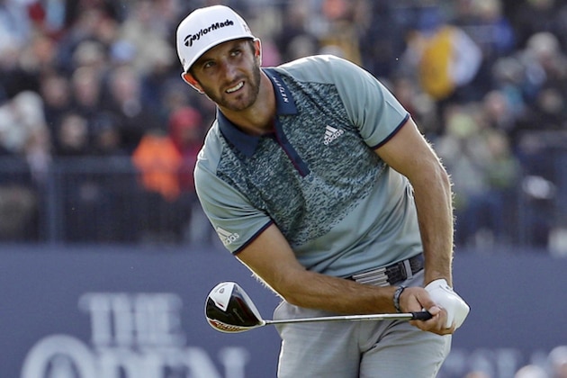 FILE - In this July 18, 2015, file photo, United States' Dustin Johnson follows his drive from the 18th tee during the second round of the British Open Golf Championship at the Old Course, St. Andrews, Scotland. The Open is scheduled for July 14–17, 2016, at Royal Troon Golf Club in Ayrshire, Scotland. AP Photo/David J. Phillip, File)