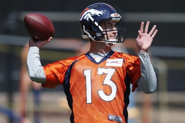 Denver Broncos quarterback Trevor Siemian (13) during an NFL football practice Tuesday, May 24, 2016, at the team's headquarters in Englewood, Colo. (AP Photo/David Zalubowski)