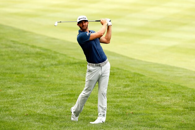 AKRON, OH - JULY 03:  Dustin Johnson plays a shot on the 17th hole during the final round of the World Golf Championships - Bridgestone Invitational at Firestone Country Club South Course on July 3, 2016 in Akron, Ohio.  (Photo by Gregory Shamus/Getty Images)