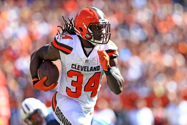 Sep 20, 2015; Cleveland, OH, USA; Cleveland Browns running back Isaiah Crowell (34) runs the ball during the third quarter against the Tennessee Titans at FirstEnergy Stadium. Mandatory Credit: Andrew Weber-USA TODAY Sports