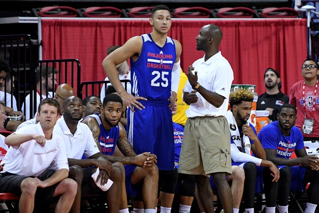 Jul 12, 2016; Las Vegas, NV, USA; Philadelphia 76ers Summer League head coach Lloyd Pierce talks to forward Ben Simmons (25) on the bench during an NBA Summer League game against the Golden State Warriors at Thomas & Mack Center. Golden State won the game 85-77. Mandatory Credit: Stephen R. Sylvanie-USA TODAY Sports