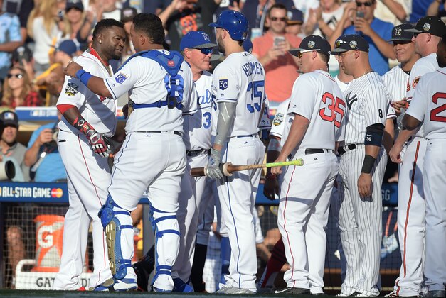 Jul 12, 2016; San Diego, CA, USA; American League player David Ortiz (34) of the Boston Red Sox is greeted by his teammates as he is replaced in the third inning in the 2016 MLB All Star Game at Petco Park. Mandatory Credit: Gary A. Vasquez-USA TODAY Sports