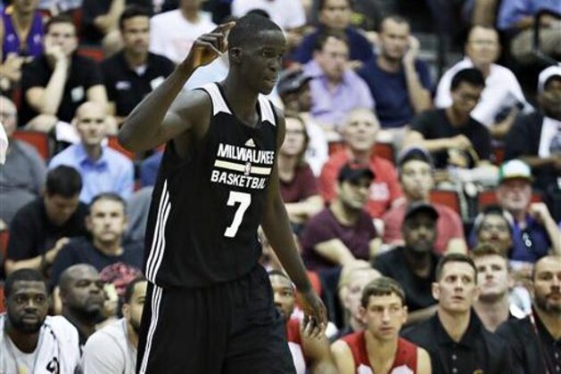 Milwaukee Bucks' Thon Maker celebrates after scoring against the Cleveland Cavaliers during the first half of an NBA summer league basketball game,Friday, July 8, 2016, in Las Vegas. (AP Photo/John Locher)