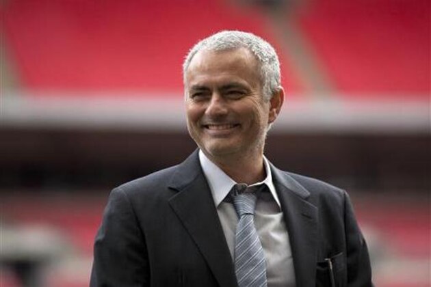 FILE- In this Monday, Feb. 1, 2016 file photo, former Chelsea manager Jose Mourinho smiles as he attends an event at Wembley Stadium in London.  Now manager of Manchester United,  Mourinho says the club is in need of both a quick-fix and long-term stability, as the 53-year-old enigmatic Portuguese was presented to the media for the first time Tuesday July 5, 2016.  (AP Photo/Matt Dunham, FILE)