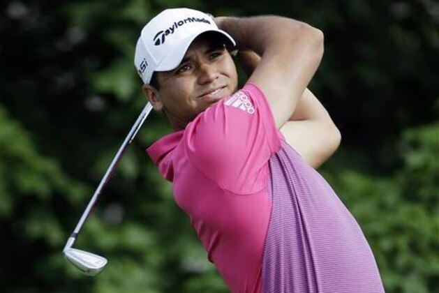 ILE - In this June 3, 2016, file photo, Jason Day, of Australia, tees off on the 14th hole during the second round of the Memorial golf tournament in Dublin, Ohio. The British Open is scheduled for July 14–17, 2016, at Royal Troon Golf Club in Ayrshire, Scotland.  (AP Photo/Darron Cummings, File)