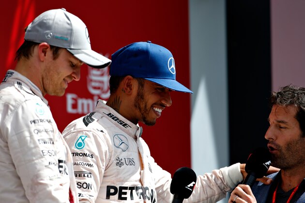 NORTHAMPTON, ENGLAND - JULY 10: Lewis Hamilton of Great Britain and Mercedes GP talks with Mark Webber and Nico Rosberg of Germany and Mercedes GP on the podium during the Formula One Grand Prix of Great Britain at Silverstone on July 10, 2016 in Northampton, England.  (Photo by Charles Coates/Getty Images)