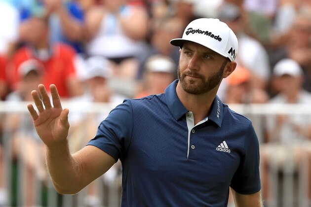AKRON, OH - JULY 03:  Dustin Johnson reacts on the 18th green after a putt during the final round of the World Golf Championships - Bridgestone Invitational at Firestone Country Club South Course on July 3, 2016 in Akron, Ohio.  (Photo by Sam Greenwood/Getty Images)