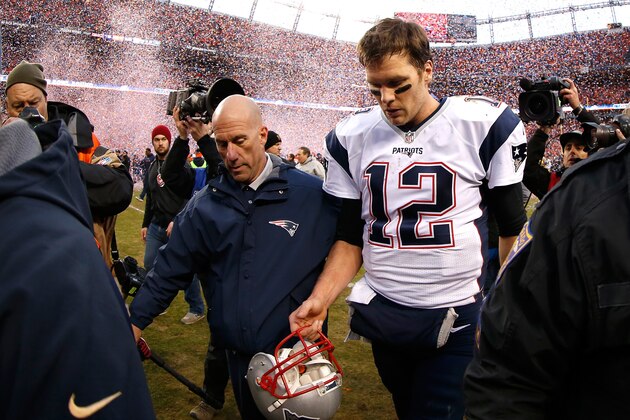 DENVER, CO - JANUARY 24:  Tom Brady #12 of the New England Patriots walks off the field after being defeated by the Denver Broncos in the AFC Championship game at Sports Authority Field at Mile High on January 24, 2016 in Denver, Colorado.  The Broncos defeated the Patriots 20-18.  (Photo by Ezra Shaw/Getty Images)