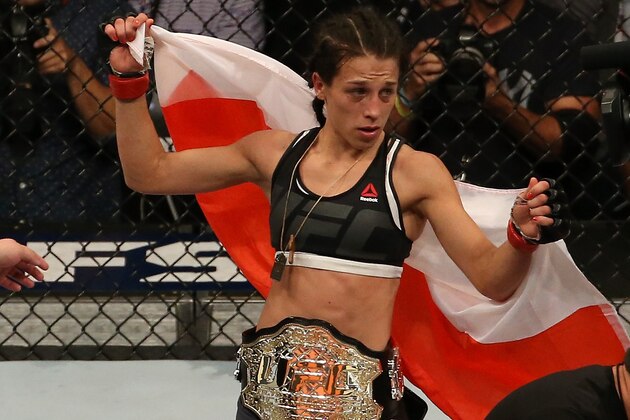 LAS VEGAS, NV - JULY 08:  Joanna Jedrzejczyk of Poland celebrates after the conclusion of her UFC women's strawweight championship bout against Claudia Gadelha during The Ultimate Fighter Finale event at MGM Grand Garden Arena on July 8, 2016 in Las Vegas, Nevada.  (Photo by Ed Mulholland/Zuffa LLC/Zuffa LLC via Getty Images)