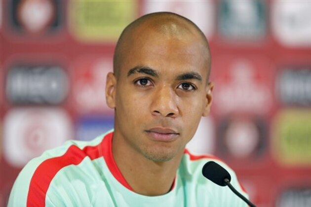 Portugal's Joao Mario ponders a question during a press conference, in preparation of the Euro 2016 final soccer match between France and Portugal, at Marcoussis, south of Paris, France, Friday, July 8, 2016. (AP Photo/Francois Mori)