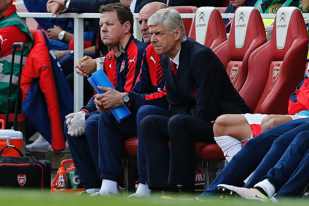 Arsenal's French manager Arsene Wenger (R) watches during the English Premier League football match between Arsenal and Aston Villa at the Emirates Stadium in London on May 15, 2016.  / AFP / Ian Kington / RESTRICTED TO EDITORIAL USE. No use with unauthorized audio, video, data, fixture lists, club/league logos or 'live' services. Online in-match use limited to 75 images, no video emulation. No use in betting, games or single club/league/player publications.  /         (Photo credit should read IAN KINGTON/AFP/Getty Images)