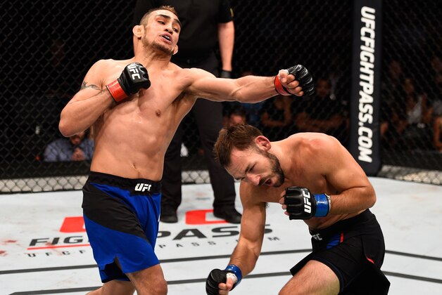 SIOUX FALLS, SD - JULY 13: (L-R) Tony Ferguson punches Lando Vannat in their lightweight bout during the UFC Fight Night event on July 13, 2016 at Denny Sanford Premier Center in Sioux Falls, South Dakota. (Photo by Jeff Bottari/Zuffa LLC/Zuffa LLC via Getty Images) SIOUX FALLS, SD - JULY 13: (L-R) Tony Ferguson punches Lando Vannat in their lightweight bout during the UFC Fight Night event on July 13, 2016 at Denny Sanford Premier Center in Sioux Falls, South Dakota. (Photo by Jeff Bottari/Zuffa LLC/Zuffa LLC via Getty Images)