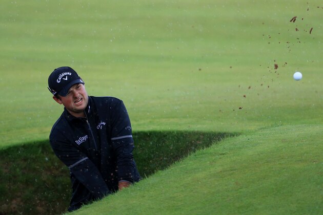 TROON, SCOTLAND - JULY 13:  Patrick Reed of the United States plays a shot from a bunker on the 4th hole during a practice round ahead of the 145th Open Championship at Royal Troon on July 13, 2016 in Troon, Scotland.  (Photo by Matthew Lewis/Getty Images)