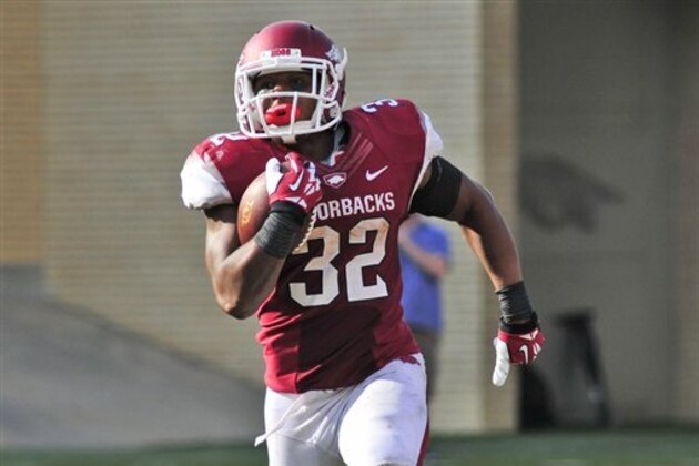 Arkansas running back Jonathan Williams (32) carries against Louisiana-Lafayette during the second half of an NCAA college football game in Fayetteville, Ark., Saturday, Aug. 31, 2013. Arkansas defeated Louisiana-Lafayette 34-14. (AP Photo/April L. Brown)
