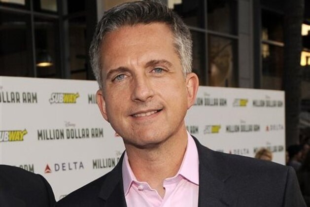 FILE - In this May 6, 2014 file photo, Bill Simmons arrives at the world premiere of