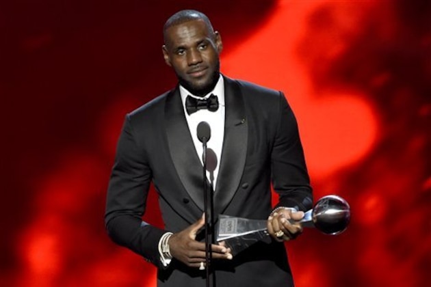 NBA basketball player LeBron James, of the Cleveland Cavaliers, accepts the award for best male athlete at the ESPY Awards at the Microsoft Theater on Wednesday, July 13, 2016, in Los Angeles. (Photo by Chris Pizzello/Invision/AP)