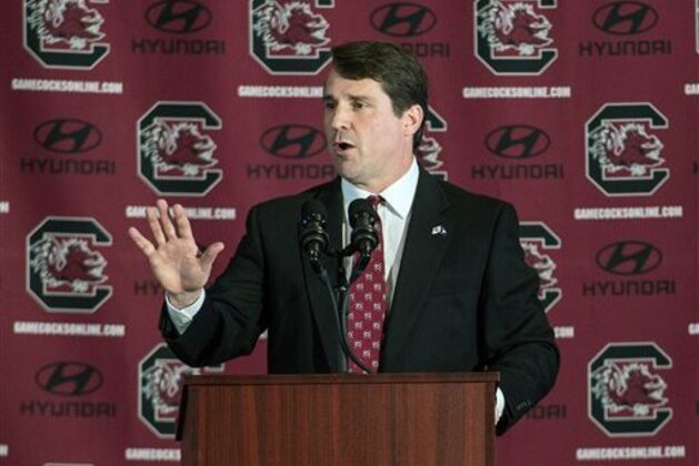 FILE - In this Dec. 7, 2015 file photo, New South Carolina head football coach Will Muschamp speaks with the media at Williams Brice Stadium in Columbia, S.C. The Southeastern Conference Eastern Division’s new look added more intrigue than usual to spring practice. Three of the division’s seven teams - Georgia, Missouri and South Carolina - are breaking in new head coaches. (AP Photo/Sean Rayford, File)