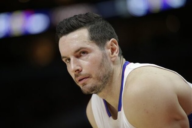 Los Angeles Clippers' J.J. Redick watches during the first half of an NBA basketball game against the Portland Trail Blazers, Wednesday, March 4, 2015, in Los Angeles. (AP Photo/Jae C. Hong)