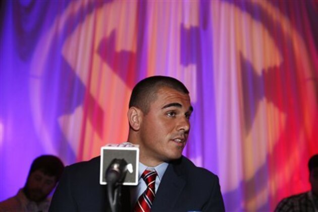 Mississippi quarterback Chad Kelly speaks to the media at the Southeastern Conference NCAA college football media days, Thursday, July 14, 2016, in Hoover, Ala. (AP Photo/Brynn Anderson)