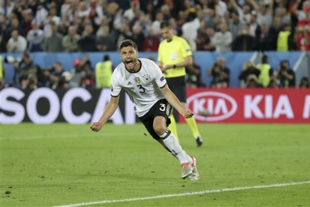 Germany's Jonas Hector celebrates after scoring the winning penalty during the Euro 2016 quarterfinal soccer match between Germany and Italy, at the Nouveau Stade in Bordeaux, France, Saturday, July 2, 2016. Germany beat Italy 6-5 in a penalty shootout. (AP Photo/Antonio Calanni) Germany's Jonas Hector celebrates after scoring the winning penalty during the Euro 2016 quarterfinal soccer match between Germany and Italy, at the Nouveau Stade in Bordeaux, France, Saturday, July 2, 2016. Germany beat Italy 6-5 in a penalty shootout. (AP Photo/Antonio Calanni)