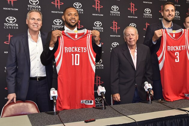 HOUSTON, TX - JULY 09:  Houston Rockets, Head Coach Mike D'Antoni and Owner Leslie Alexander announce the signings of Ryan Anderson #3 and Eric Gordon #15 during a press conference on July 09, 2016 at Toyota Center in Houston, Texas. NOTE TO USER: User expressly acknowledges and agrees that, by downloading and or using this photograph, User is consenting to the terms and conditions of the Getty Images License Agreement. Mandatory Copyright Notice: Copyright 2016 NBAE (Photo by Bill Baptist/NBAE via Getty Images)