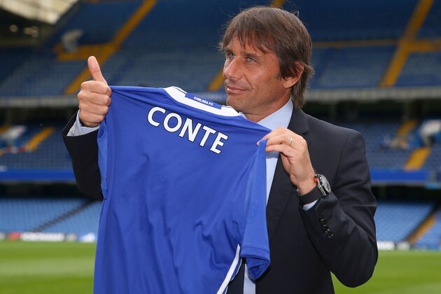LONDON, ENGLAND - JULY 14: The new Chelsea Manager Antonio Conte poses with a Chelsea shirt at Stamford Bridge on July 14, 2016 in London, England.  (Photo by Steve Bardens/Getty Images)